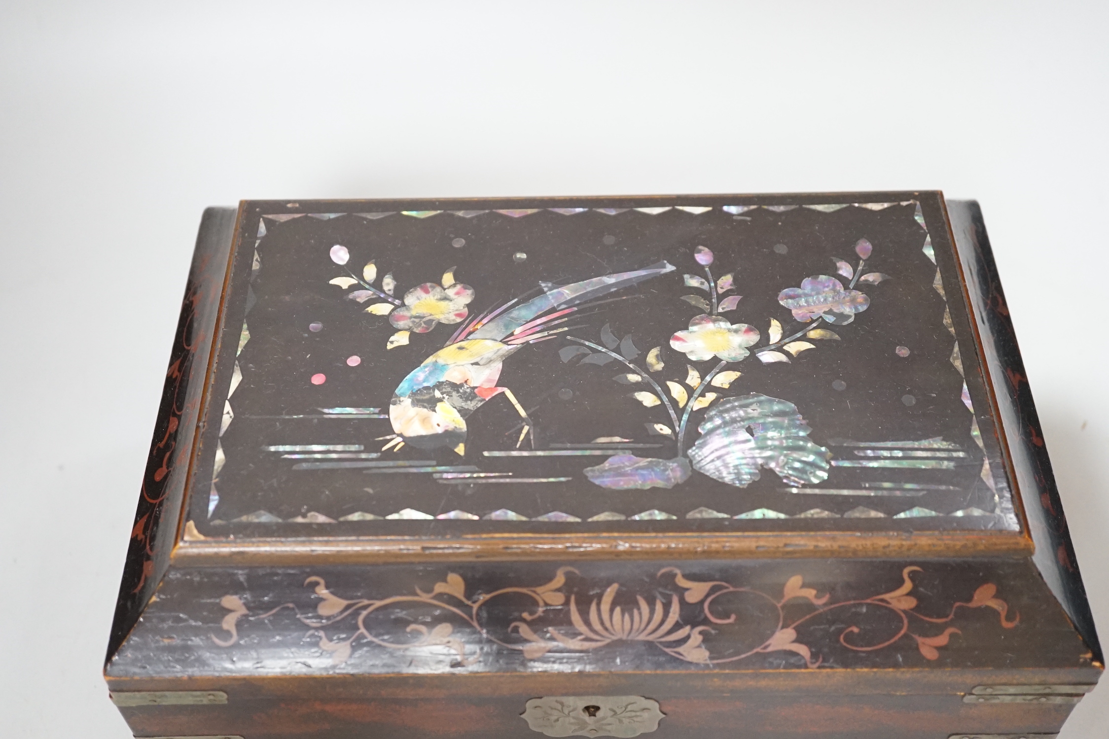 A 19th century Japanese abalone inlaid lacquered casket, 27cm wide